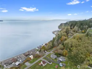 Premium sloped lot near beach access—perfect for a view-oriented custom build.