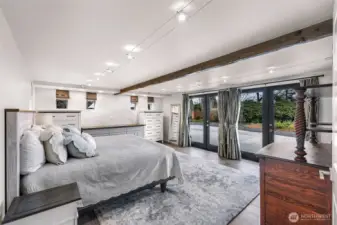 Bedroom 2 downstairs - this space can be utilized and a flex or MIL, plumbing and drains have been installed to add kitchenette