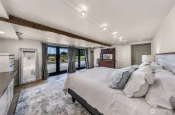 Double French doors open this space, exposed beams brings  warmth and comfort