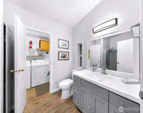 Primary bath with walk through to the utility room