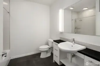Spacious bathroom with full bathtub