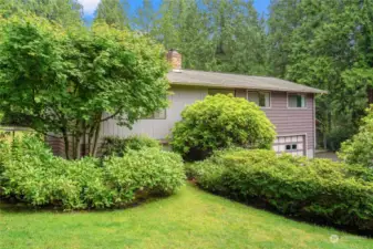 The lush gardens surround this beautiful property in a prime location!