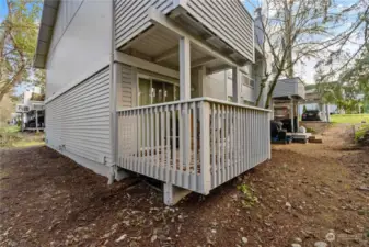 Every apartment has a good size deck facing the trees and nature and one can access the back area to the parking.