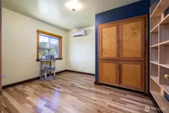 Bedroom Upstairs with a view of the yard.