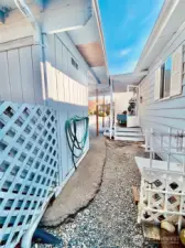 East between Carport and house