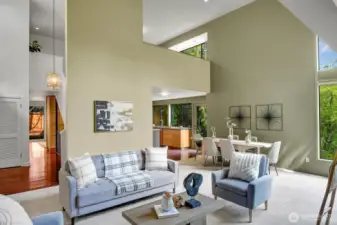 A look back toward the entry of the home. The lofted 2nd bedroom is also in view in this photo.