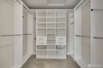 Walk in closet well organized.