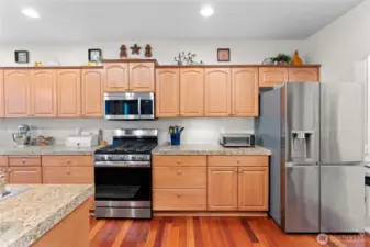 Open Concept Kitchen with Newer Stainless Steel Appliances
