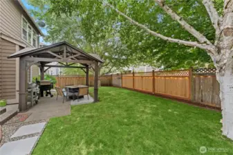 Tranquil Backyard Space with Gazebo and Firepit