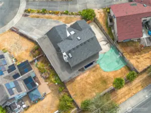 The driveway allows for tons of extra parking, if the garage and carport aren't enough for you! This flag-shaped lot maximizes its size with the massive backyard and sport court, covered patio and is fully fenced!