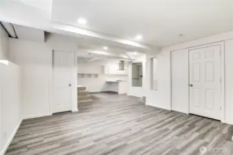 Add a murphy bed to this room and you have a great studio space! The recessed lighting helps this space feel bright and cozy.
