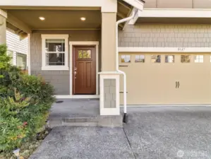 Inviting entryway with covered porch and classic pacific northwest curb appeal.