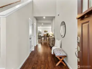 Bright, welcoming entry with tall ceilings leading into the open-concept main level.