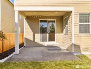 Covered back patio provides year-round outdoor enjoyment in this NE Lacey home.