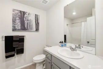 Guest bath with tub.
