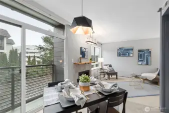 A wide sliding glass door and tall view windows enjoy Southeastern light through the day. The unit offers a serene view of a tall Arbor Vitae landscape barrier that helps with privacy and sits above the back drive to the garages.