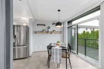 Transom windows, upgraded lighting design and upgrade plumbing fixtures blend with custom-designed, on-trend open shelving appointments to give the home a feeling of today, with the solid construction of yesterday.