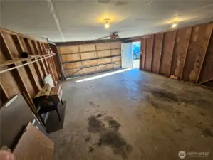 Detached garage with plenty of room for your vehicles and supplies.