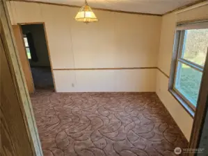 Conveniently located next to the kitchen is the dining area.