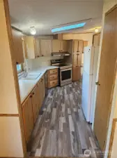 The kitchen view from the dining area.