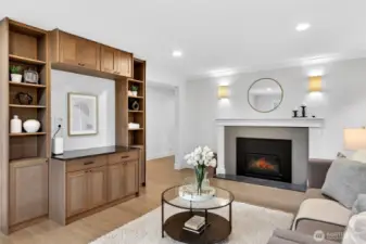 This console was custom-built for this space and has elevated outlets for wireless viewing.