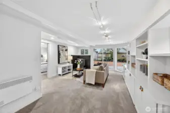 The family room is on the main-level just off the dining area and leads to a large second bedroom and to the backyard.