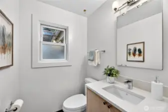 This charming half bath is located on the main floor.