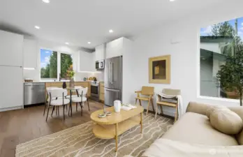 Expansive windows and engineered hardwoods are refreshing details.