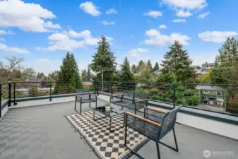 Large rooftop deck with territorial views.