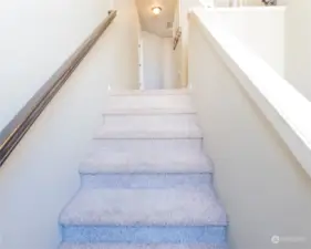 Plenty of natural light from the large stair window, brightening the space.