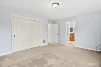 Primary bedroom with natural lighting