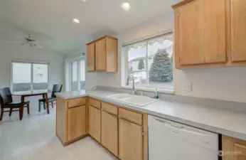 Kitchen flows into bright, spacious breakfast room