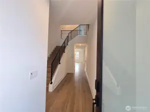 Two Story Open Entry with Extensive Metal, Open Railing