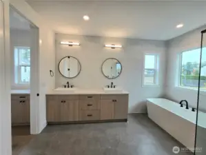 Double Vanity with Full Tile Wall and Designer Mirrors