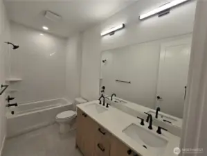 Hall Bathroom Upstairs Featuring Double Vanity