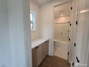 Cabinets In between Secondary Guest Suite and Bath.