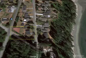 nearly half an acre across the street from waterfront.