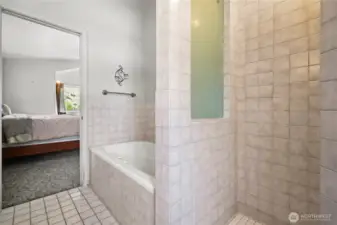Oversized soaking tub with a stylish tile surround