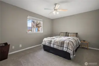 Bedroom #1 located on the northwest corner of the main level with double closets and built in organizers.