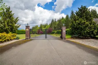 Access neighborhood via private gate by using access code or remote entry.