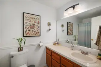 The full bathroom features a tub and shower and is a great size.