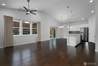 Livingroom adjoins kitchen and dining area.