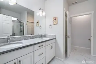Primary bath with large walk in shower.