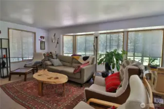 Spacious living room, large widows for natural light.