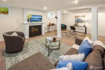 Expansive rec room located on the lower floor is great for entertaining or relaxing.