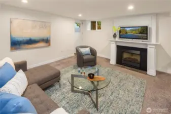 Rec room w/office space and the door out to the backyard.