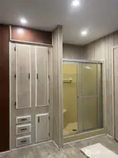 Primary 5 piece bathroom with Soaking Tub, Walk in Shower, And plentiful storage!