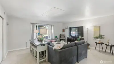 Spacious family room with sliding glass door to back patio.