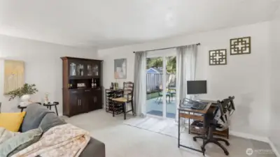 Spacious family room with sliding glass door to back patio.