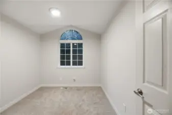 Another upstairs bedroom filled with warm natural light.with pleanty of closet space.